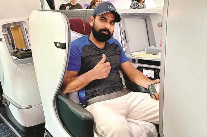Indian cricketer Mohammed Shami can be seen in the plane. Photo: PTI