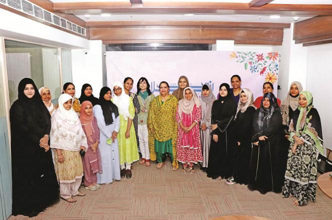 A group photo of all the women participating in the debate. Photo: Anurag Ahire