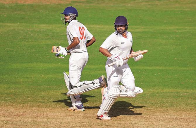 Vidarbha batsmen Karun Nair and Akshay Wadkar. Photo: PTI