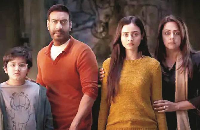 Ajay Devgn, Janaki Bodiwala, Jyothika and Angad Raj can be seen in a scene from the movie `Shaitan`. Photo: INN