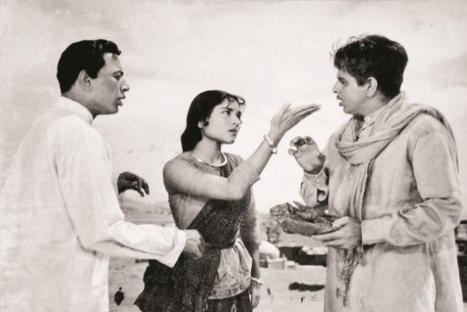 Nasir Khan can be seen with Dilip Kumar and Vijayantimala in a scene from the movie Gangna Jamna. Photo: INN