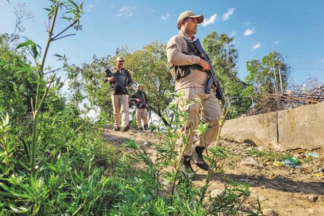 Officials of the Special Group of the Jammu and Kashmir Police in Samba during a search operation. Photo: INN