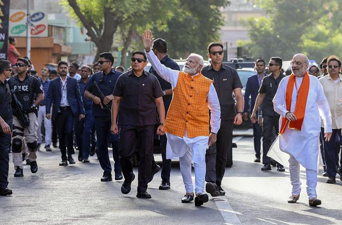 Amit Shah and Modi during a rally in Ahmedabad. Photo: PTI