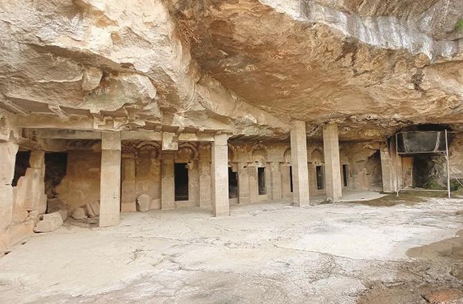 Stone carved pillars and cave entrances are visible. Photo: INN.