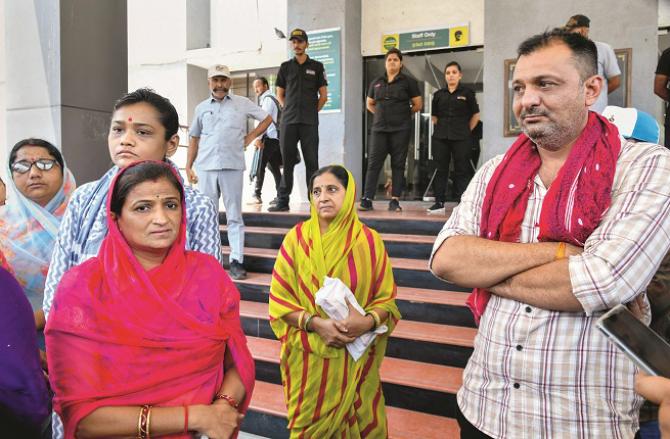 Families of children killed in Rajkot fire. Photo: PTI