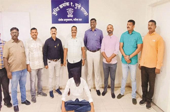 Accused Bhagwan Singh Chauhan in police custody. Photo - INN