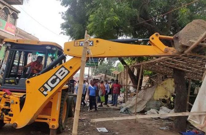 A view of the demolition by JCB. Photo: INN
