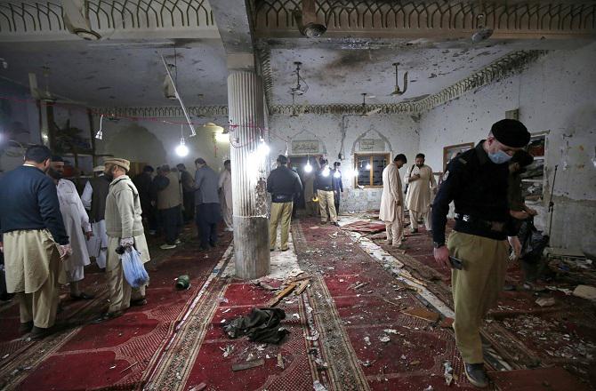 Destruction can be seen after a terrorist attack in a mosque in Peshawar. Photo: INN.