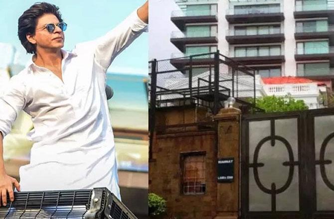 Shah Rukh Khan waving to fans from his bungalow. Photo: INN