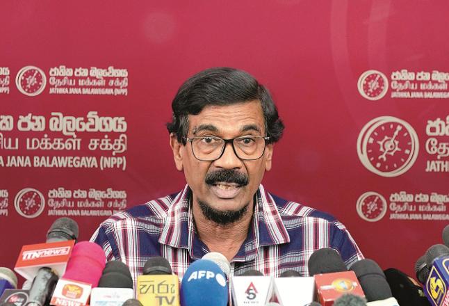 General Secretary of the People`s Liberation Front, Talvin Silva, is talking to the media in Colombo after the victory of his party. Photo: AP/PTI