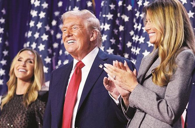 Donald Trump, his wife Melania and daughter-in-law Lara Trump, celebrating after the results. Photo: PTI