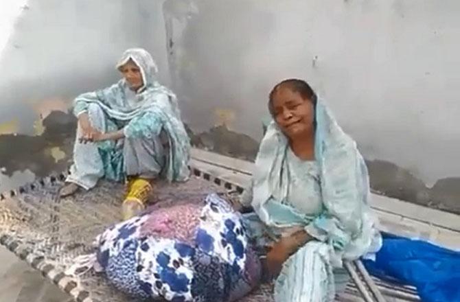 Deprived of their homes, some families are forced to sit under the open sky. Image: X