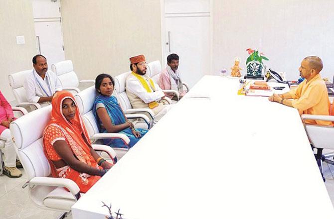 Chief Minister Yogi Adityanath met the families of the victims at his official residence. Photo: PTI