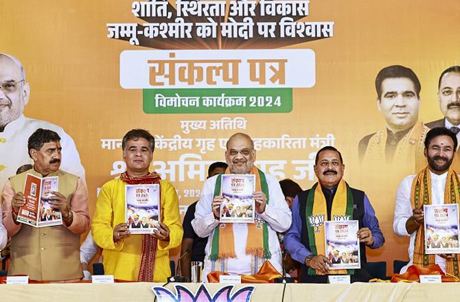 Amit Shah releasing the BJP manifesto. Photo: PTI