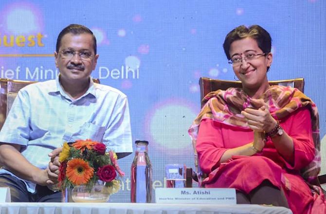 Atishi Singh and Arvind Kejriwal. Photo: INN.