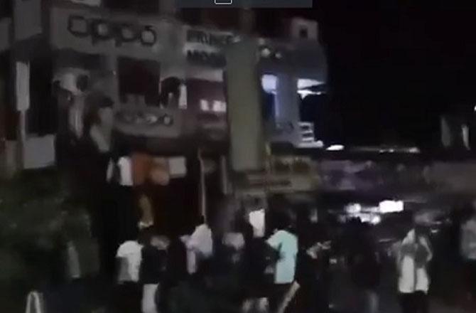 Rioters damaging shops. Photo: X