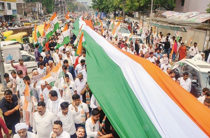 A `Aayin Bachao` (Save the Constitution) foot march was taken out with the tricolour in Bihar`s capital Patna. Photo: PTI