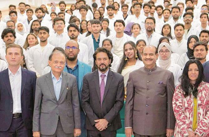 Om Birla and Anurag Thakur with students of Samarkand Medical University. Photo: PTI