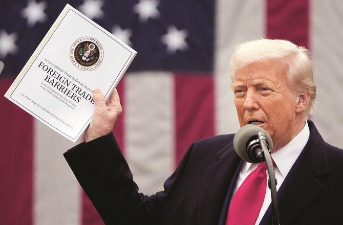 President Donald Trump delivers a speech at the White House announcing the new tariffs. Photo: PTI.