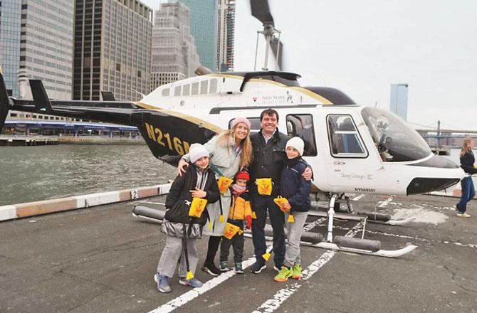 Siemens CEO Augustin before boarding a helicopter with his wife and 3 children. Photo: INN