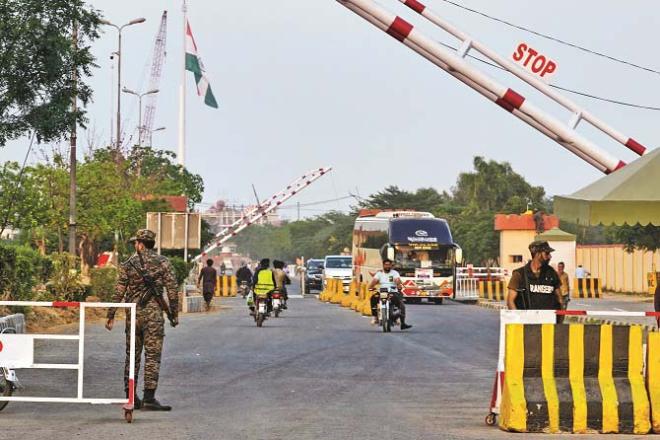 Pakistan`s paramilitary forces are seen on alert at the Wagah border after tensions with India. Photo: AP/PTI