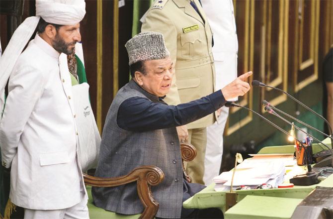 Jammu and Kashmir Assembly Speaker Abdul Rahim Rath warning the assembly members. Photo: INN