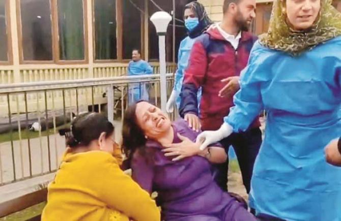 Women who lost their lives in the attack cry in grief. Photo: INN