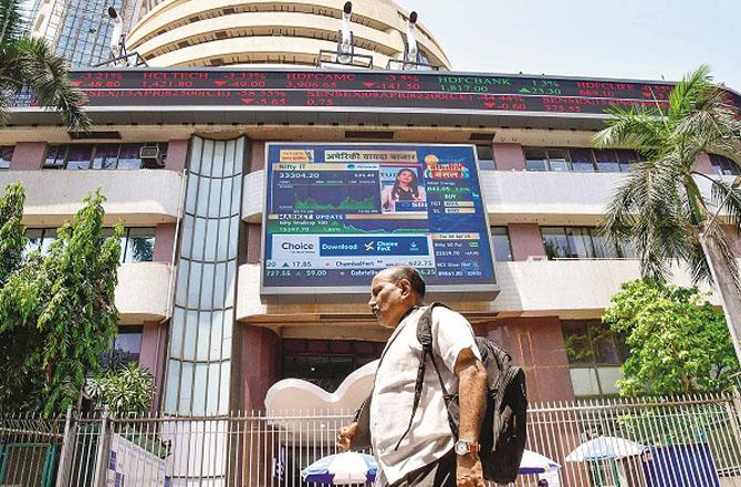 A man walks past the Bombay Stock Exchange building. Photo: PTI