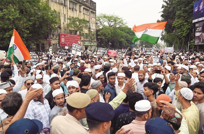 Thousands of Muslims protested against the Waqf Amendment Bill at Park Circus Crossing in Kolkata.