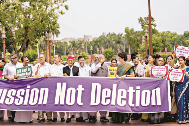 Members of Parliament and leaders of opposition parties holding banners protesting inside the parliament premises. Photo: INN