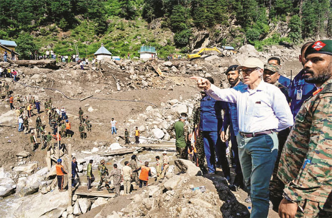 Omar Abdullah inspects the affected area