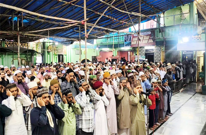 Scene of the call to prayer at Kotar Gate Mosque in Bhiwandi