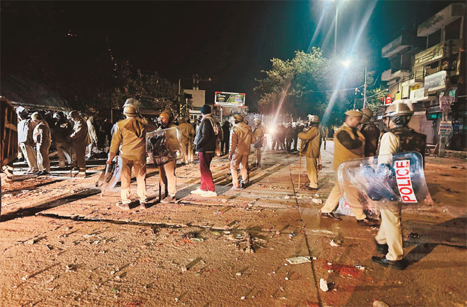 Police can be seen deployed in Chomau after the violence on Thursday night.