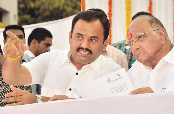 Prashant Jagtap with Sharad Pawar. (File photo)