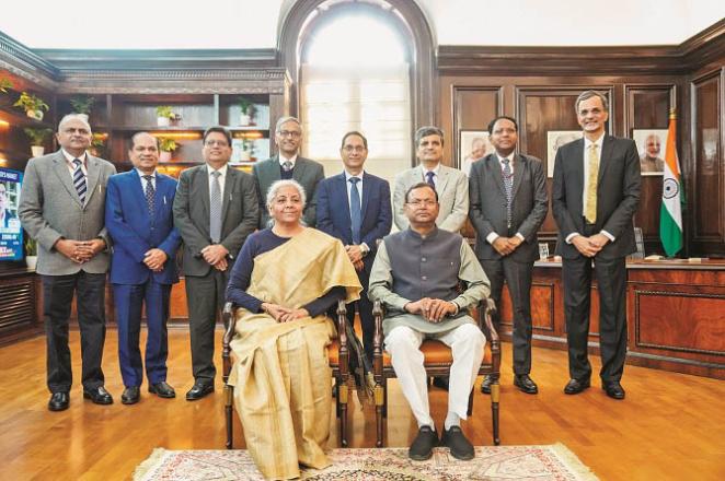 Finance Minister Nirmala Sitharaman and Minister Pankaj Chaudhary with the budget preparation team. Photo: PTI