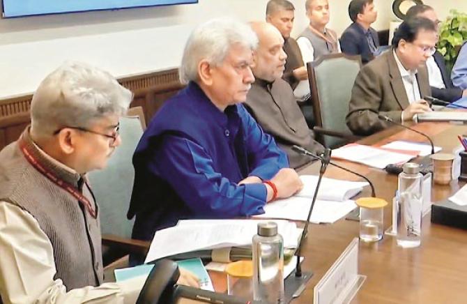 Amit Shah, Manu J Sinha and others are seen in the meeting. Photo: PTI