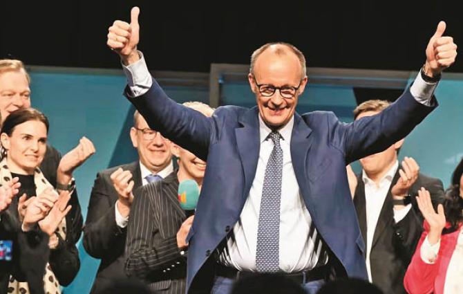 Germany`s chancellor-to-be and opposition leader Friedrich Merz can be seen expressing his happiness over his party`s historic victory in the parliamentary elections. Photo: INN