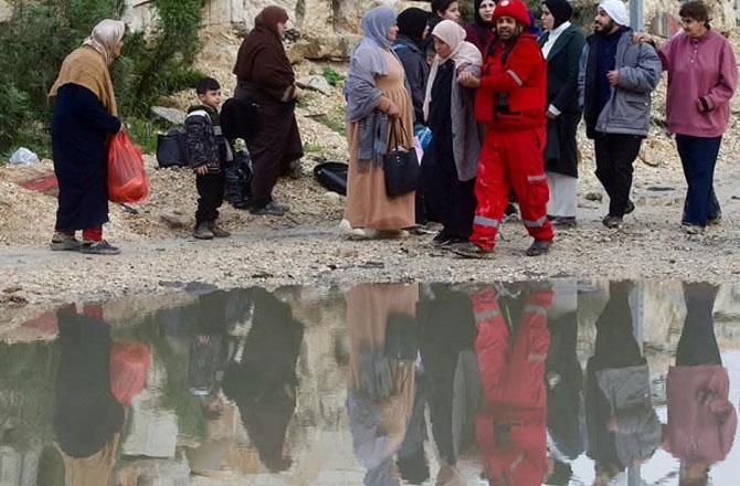 Members of the Palestinian Red Crescent delivering aid to Palestinians. Photo: X