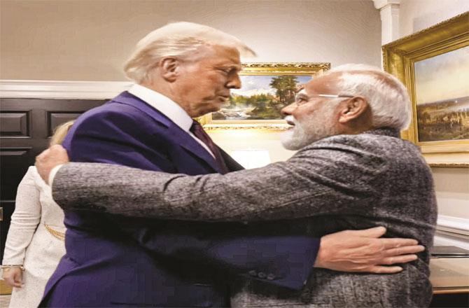 Prime Minister Modi and President Trump embracing each other in a passionate manner. (PTI)