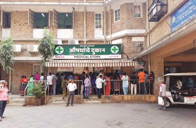 Relatives of patients receiving medicines at a government hospital in the city. (File photo)