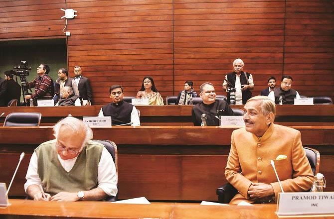 Jai Ram Ramesh and Pramod Tiwari can be seen during the party meeting yesterday. Photo: PTI