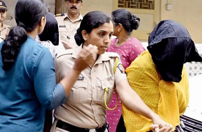 Valentina Kumari and Tania Kastava in police custody. Photo: INN
