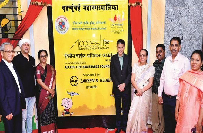 A view of the inauguration of a building built to house cancer patients and their relatives.