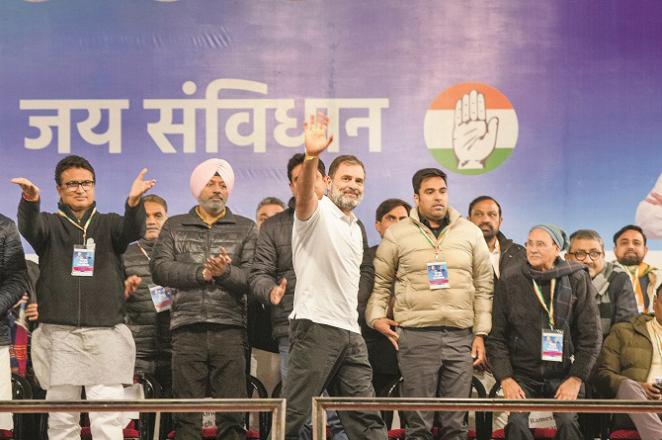 Rahul Gandhi welcoming the people after addressing the rally. Photo: PTI