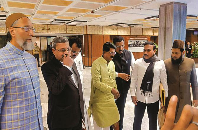 Opposition members exiting after a joint parliamentary committee meeting.