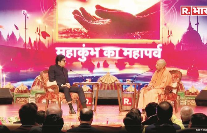 Uttar Pradesh Chief Minister Yogi Adityanath with Arnab Goswami at the `Mahakumbh Mahasamilan`. Photo: INN