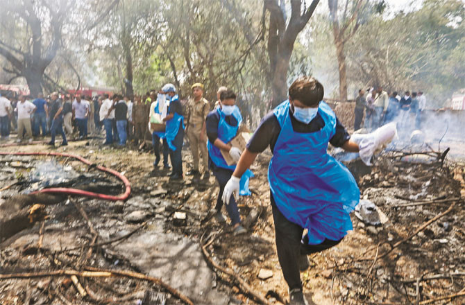 A view of the ongoing rescue and relief operation at the accident site in Ahmedabad. (PTI)
