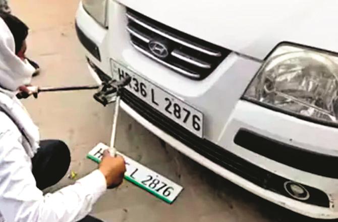 More facilities are now being provided for changing number plates in vehicles. (File photo)