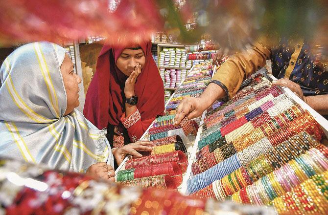 Getting matching bangles for couples on the occasion of Eid is also a difficult task. Photo: PTI.