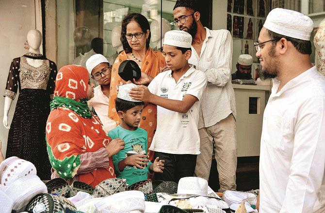 Eid preparations are underway in full swing in the historic city of Karad in Satara district. Photo: PTI.